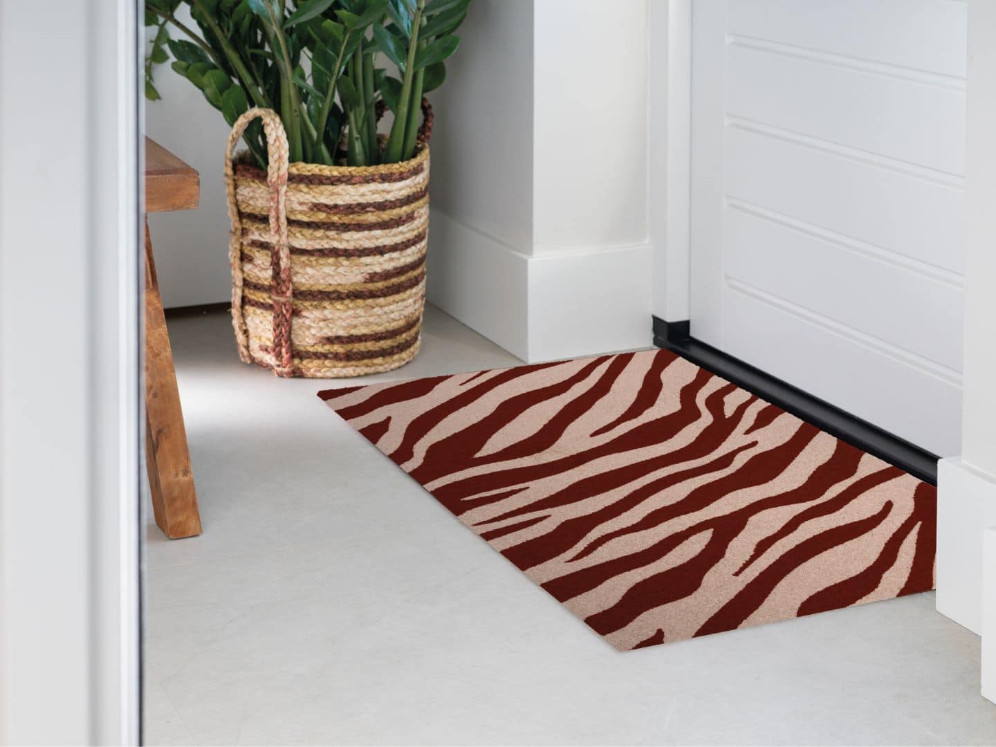 Photo of Mattigo Design mat Wildline bordeaux doormat at a front door