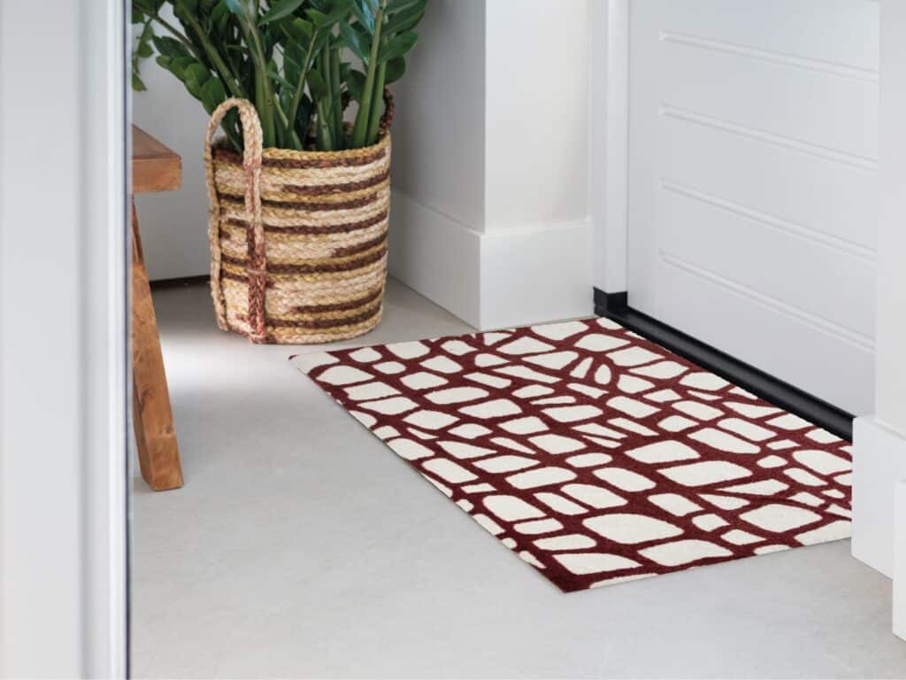 Photo of Mattigo Croc & Roll bordeaux doormat at a front door